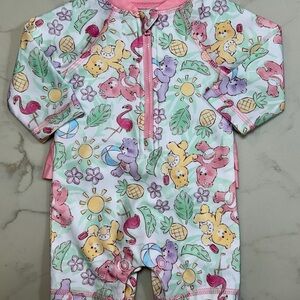 Care Bears Infant One Piece Ruffle Butt Swimsuit Rash Guard